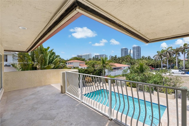 balcony featuring a patio area