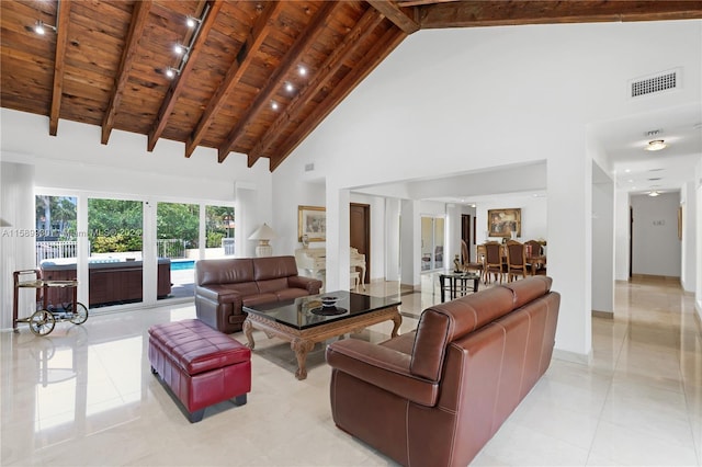 tiled living room featuring wood ceiling, beam ceiling, and high vaulted ceiling