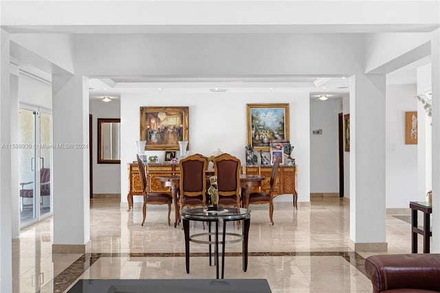 dining space featuring crown molding and a tray ceiling