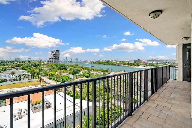 balcony featuring a water view