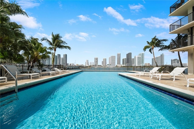 view of swimming pool featuring a patio