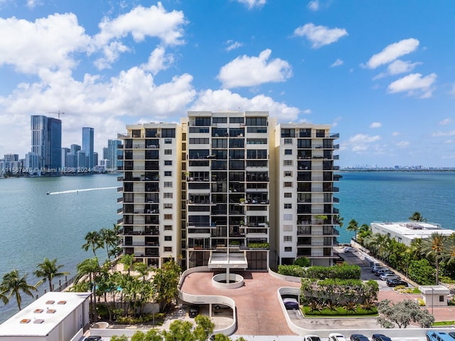 view of building exterior featuring a water view