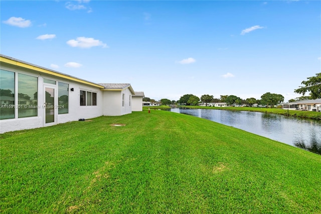 view of yard with a water view