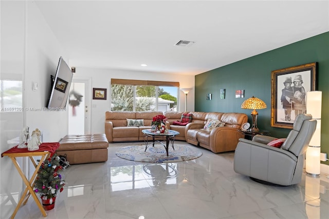 living room with light tile patterned floors