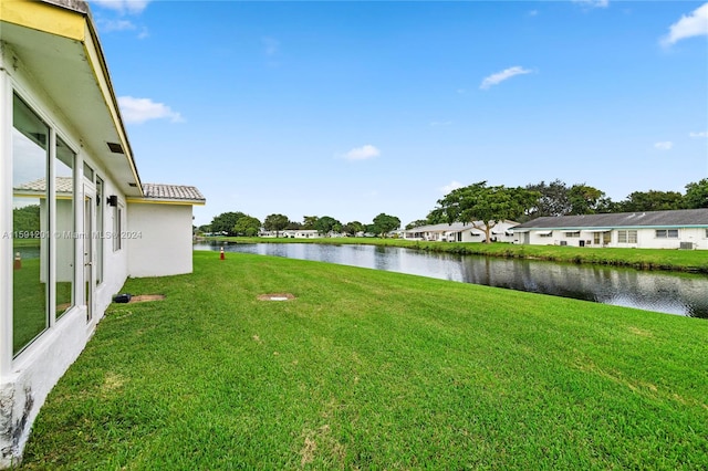 view of yard with a water view