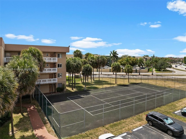 exterior space featuring tennis court