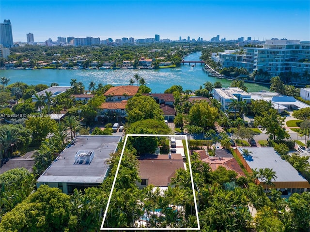 birds eye view of property featuring a water view