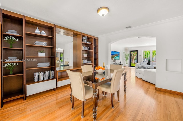 dining room with light hardwood / wood-style floors