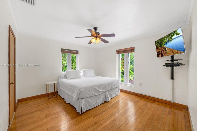 bedroom featuring ceiling fan and light wood-type flooring