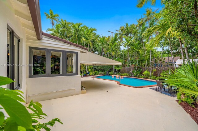 view of pool featuring a patio