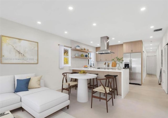 living room featuring sink