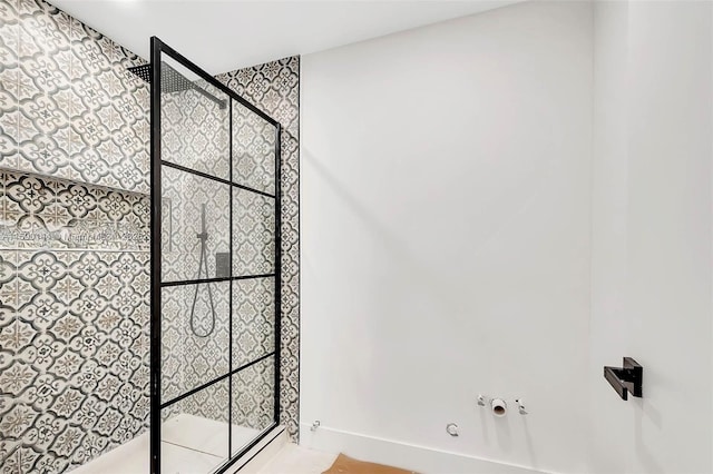 bathroom with tiled shower