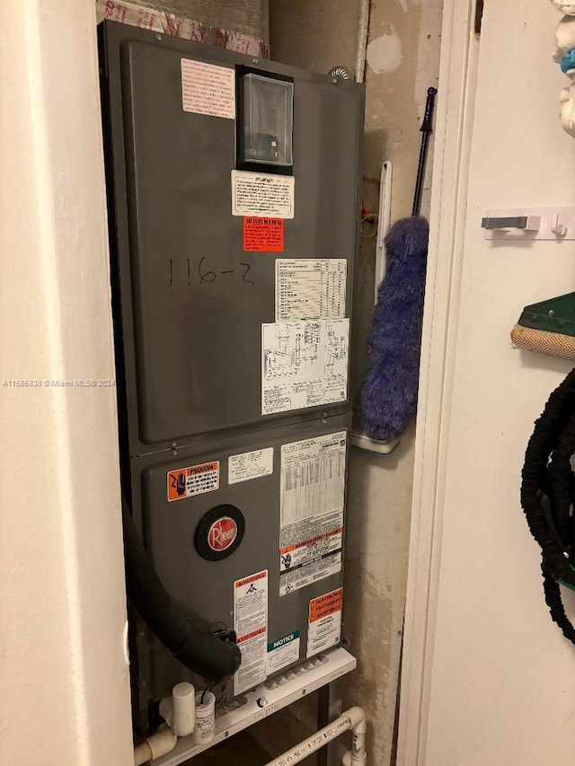 utility room with heating unit