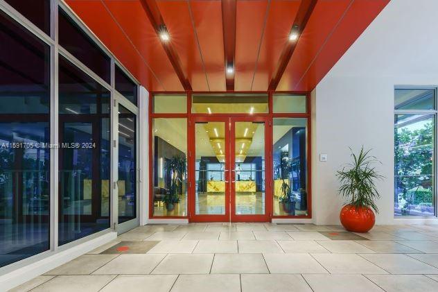 property entrance featuring french doors