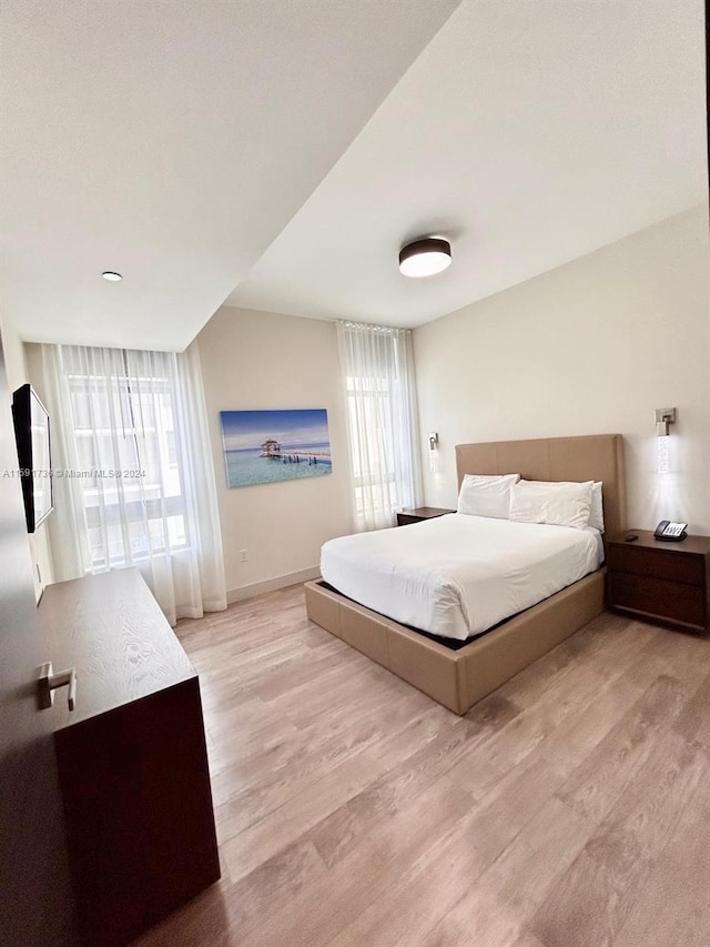 bedroom featuring light hardwood / wood-style floors