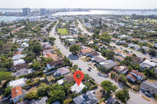 drone / aerial view featuring a water view