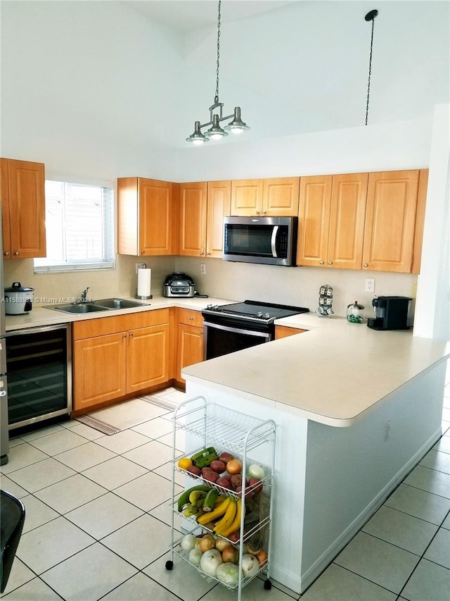 kitchen featuring light tile patterned floors, beverage cooler, electric range oven, sink, and high vaulted ceiling