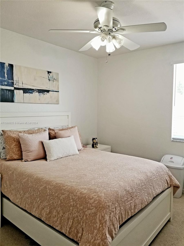 bedroom featuring carpet and ceiling fan