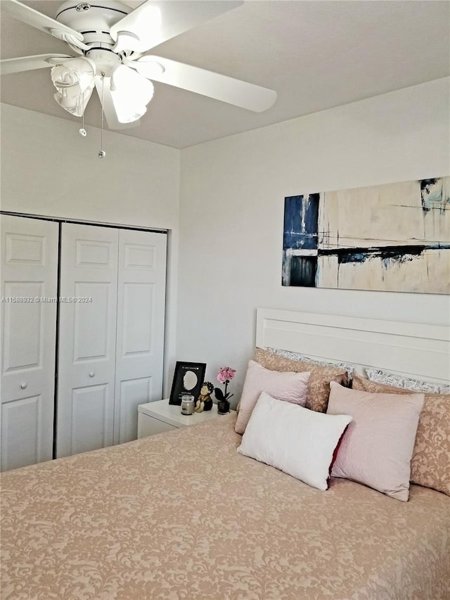 bedroom featuring a closet and ceiling fan