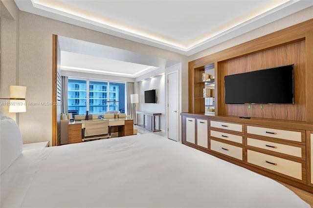 bedroom with a tray ceiling