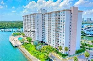 view of building exterior with a water view