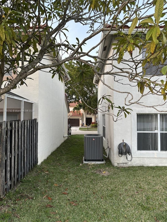 view of yard featuring central AC unit