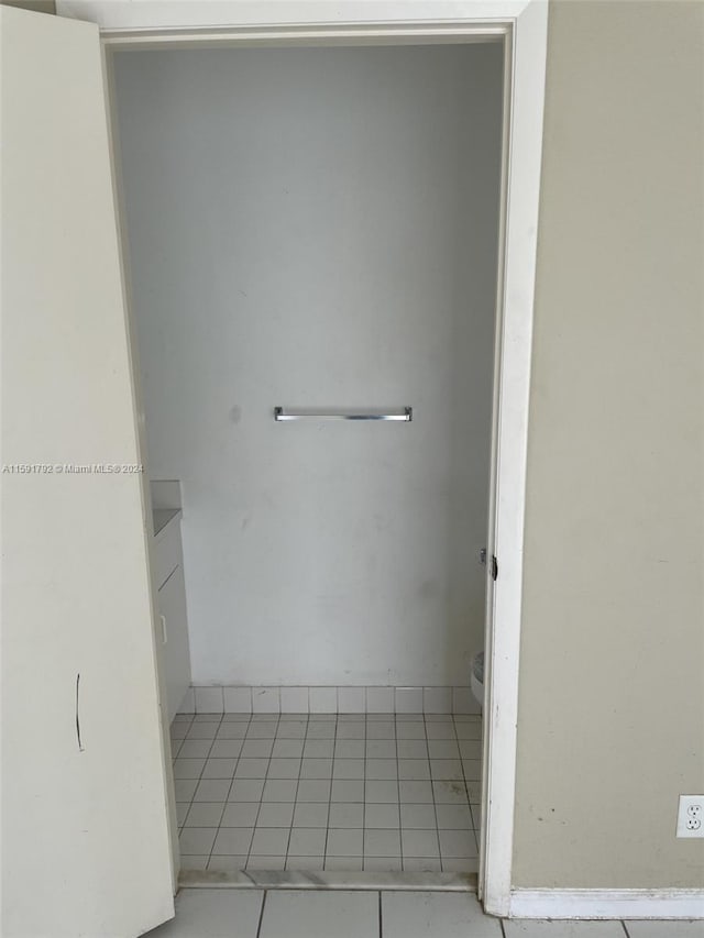 interior space with tile flooring and vanity