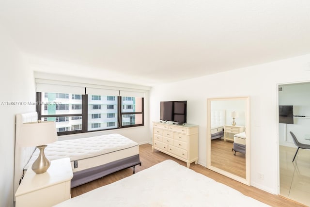 bedroom with tile floors