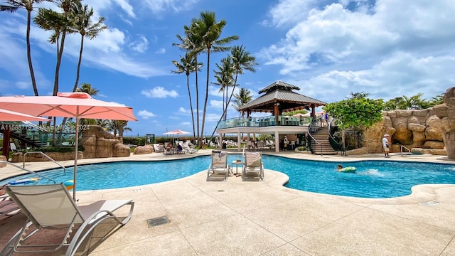 view of pool with a patio area and a gazebo