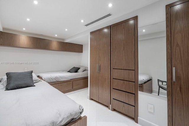 bedroom featuring recessed lighting and visible vents