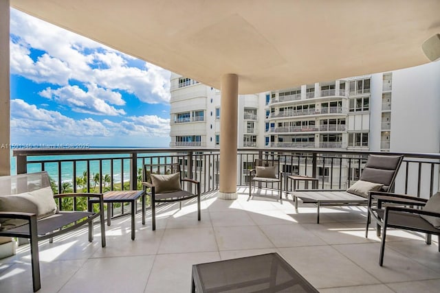 balcony featuring a water view