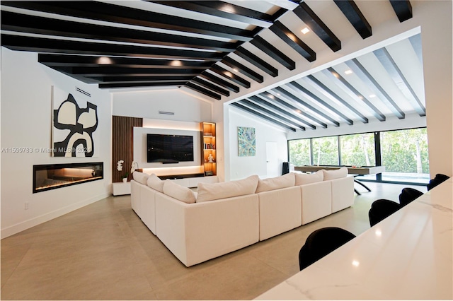 tiled living room with vaulted ceiling with beams