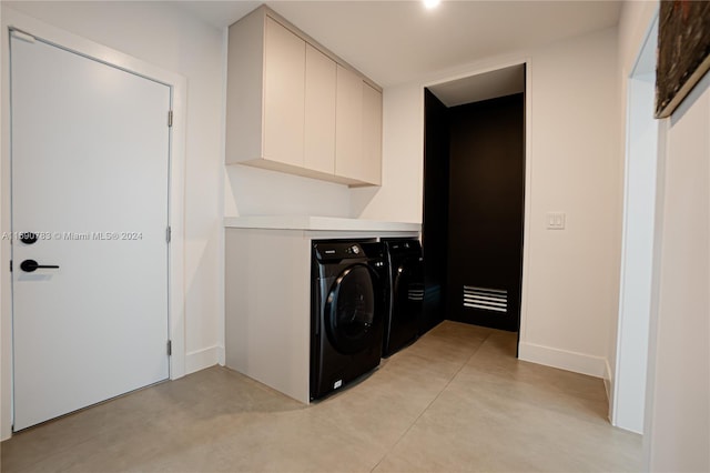 laundry area featuring separate washer and dryer