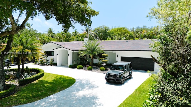 view of front of house with a garage