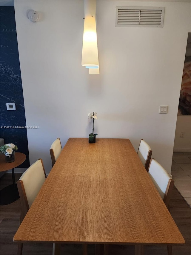 unfurnished dining area with hardwood / wood-style flooring