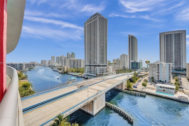 exterior space with a water view and central AC