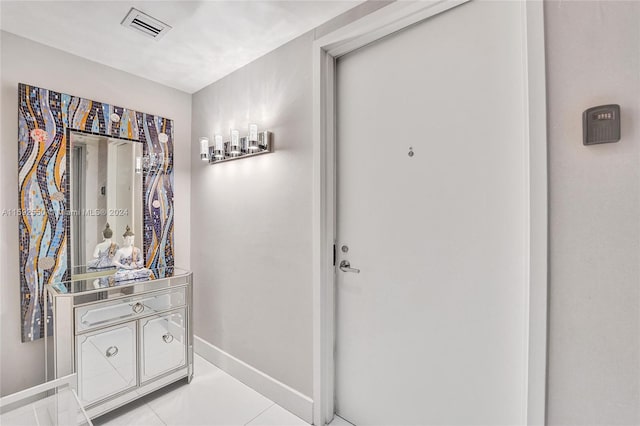 bathroom with vanity and tile patterned floors