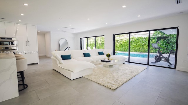 living room with light tile patterned floors