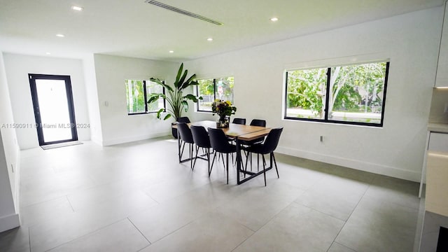 dining space featuring plenty of natural light