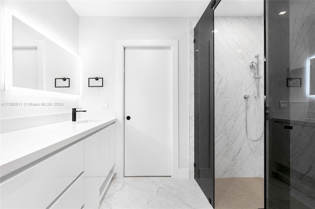 bathroom with vanity and an enclosed shower