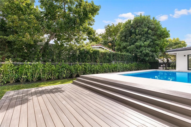 view of pool with a deck