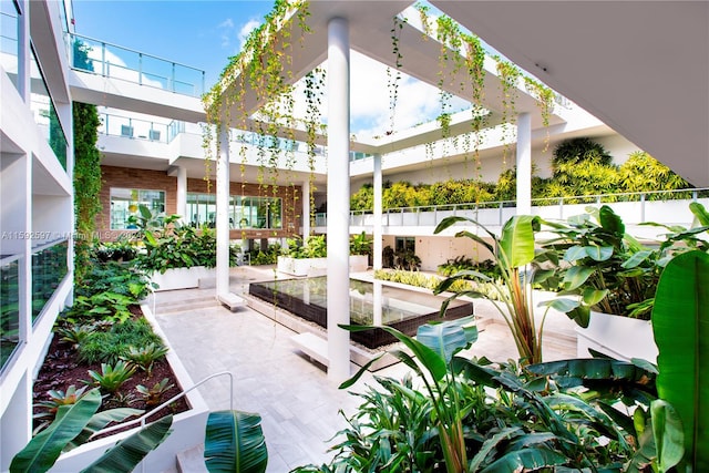 view of patio / terrace with a balcony