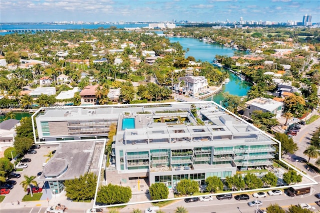 birds eye view of property featuring a water view