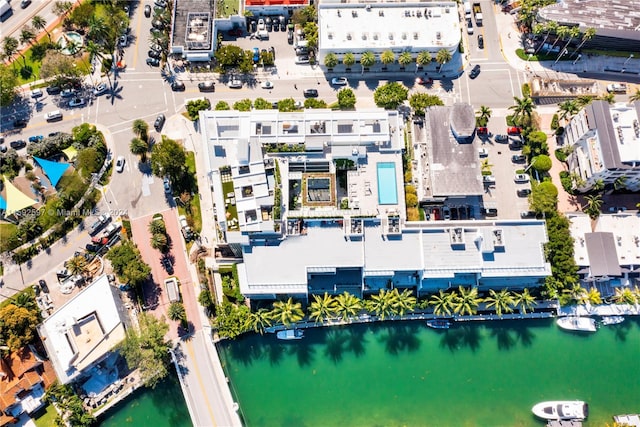 bird's eye view with a water view