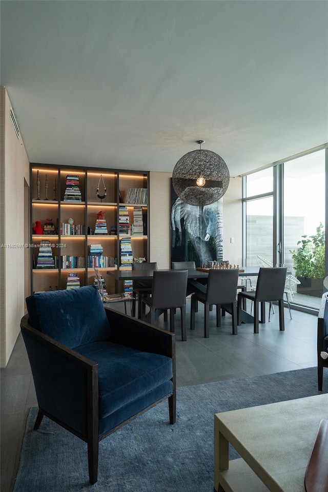 tiled living room with expansive windows