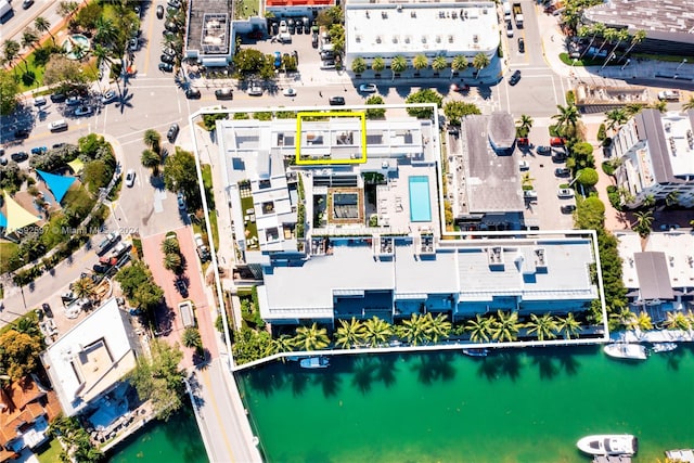 bird's eye view with a water view