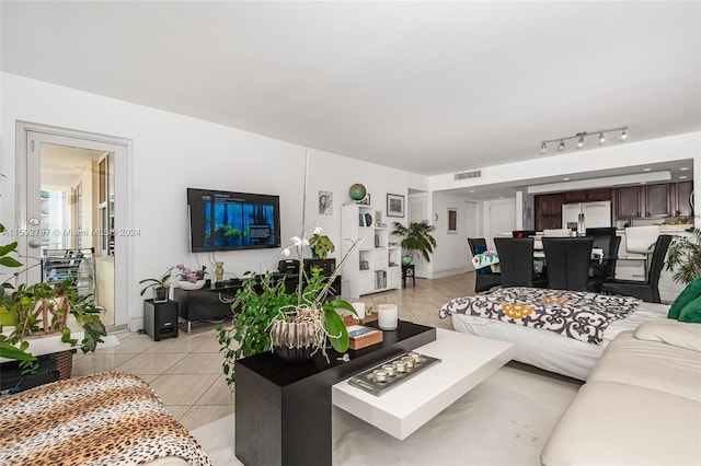 tiled living room with track lighting