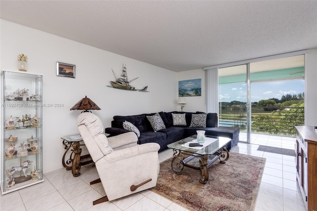 tiled living room with a textured ceiling