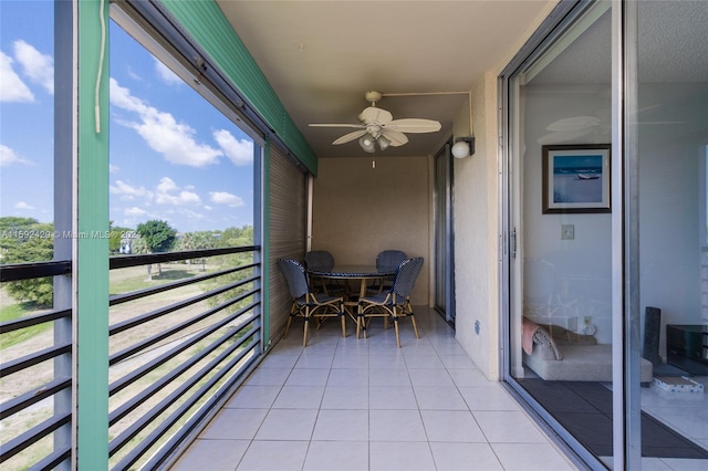 balcony featuring ceiling fan