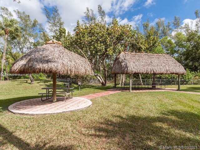 surrounding community featuring a yard and a gazebo